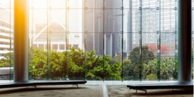 An office window overlooking buildings